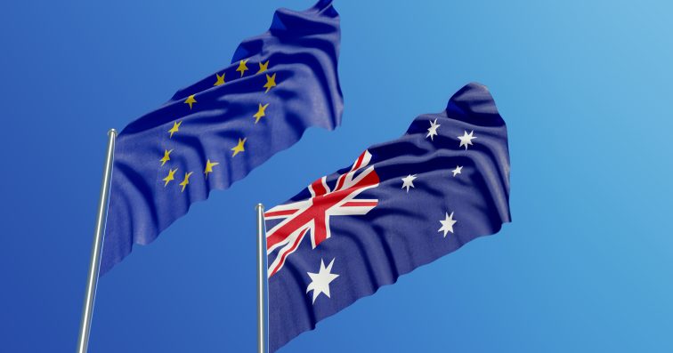 European Union and Australian Flags Waving With Wind
